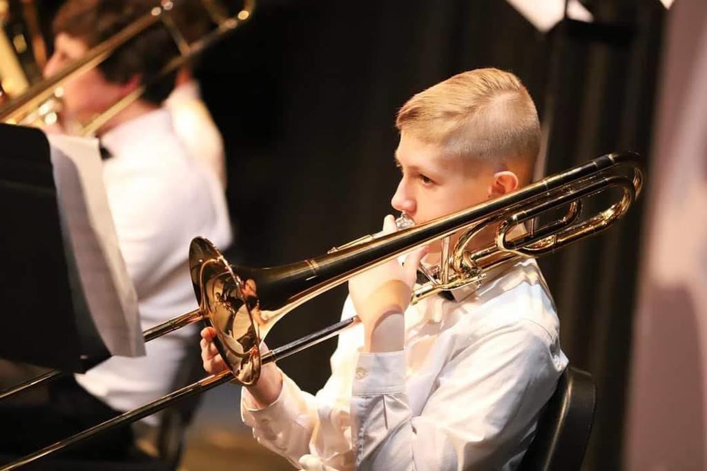 Caden Koopmans plays trombone